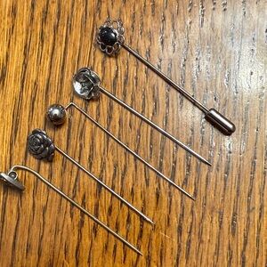 Set of silver tone stick pins